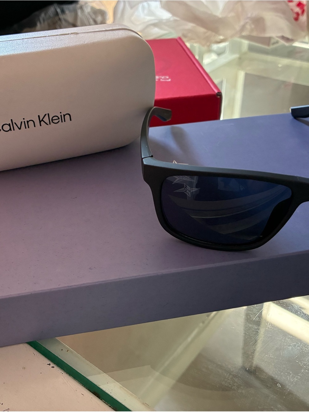 Calvin Klein Matte Black Sunglasses with Blue Lenses